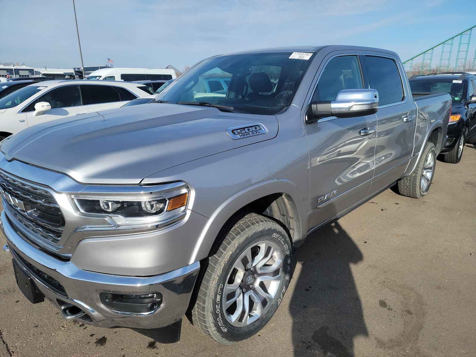 Used 2022 Ram 1500 Limited with VIN 1C6SRFHT0NN446991 for sale in Minneapolis, Minnesota