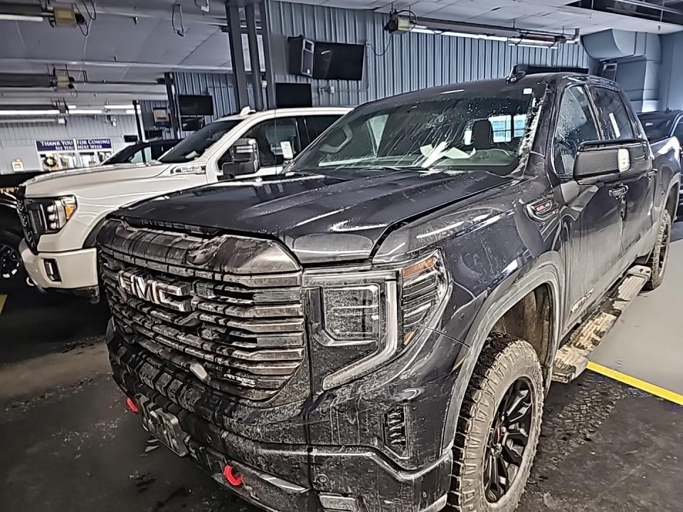 Used 2022 GMC Sierra 1500 AT4X with VIN 3GTUUFEL6NG653186 for sale in Minneapolis, Minnesota