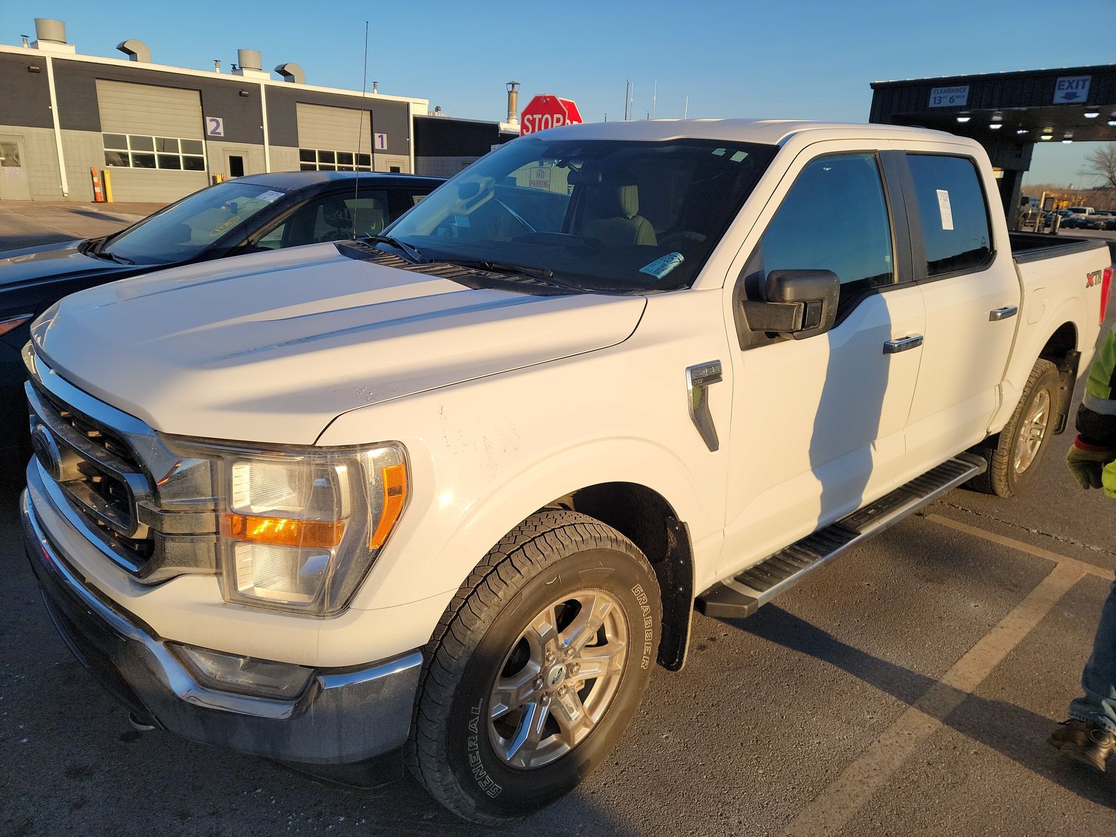 Used 2021 Ford F-150 XLT with VIN 1FTFW1E85MFA62168 for sale in Minneapolis, Minnesota