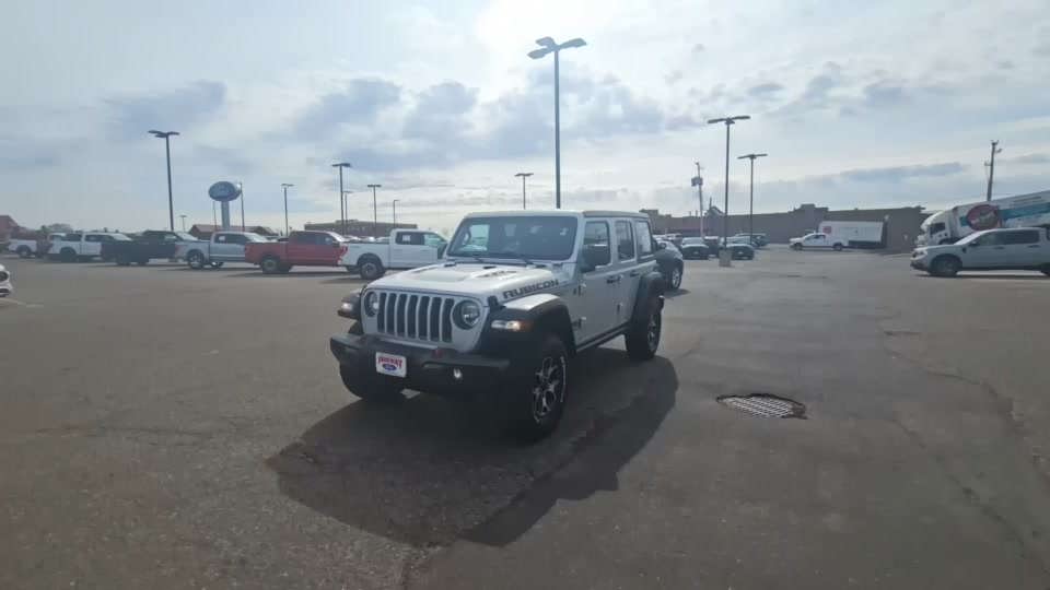 Used 2022 Jeep Wrangler Unlimited Rubicon with VIN 1C4HJXFN4NW221178 for sale in Minneapolis, Minnesota