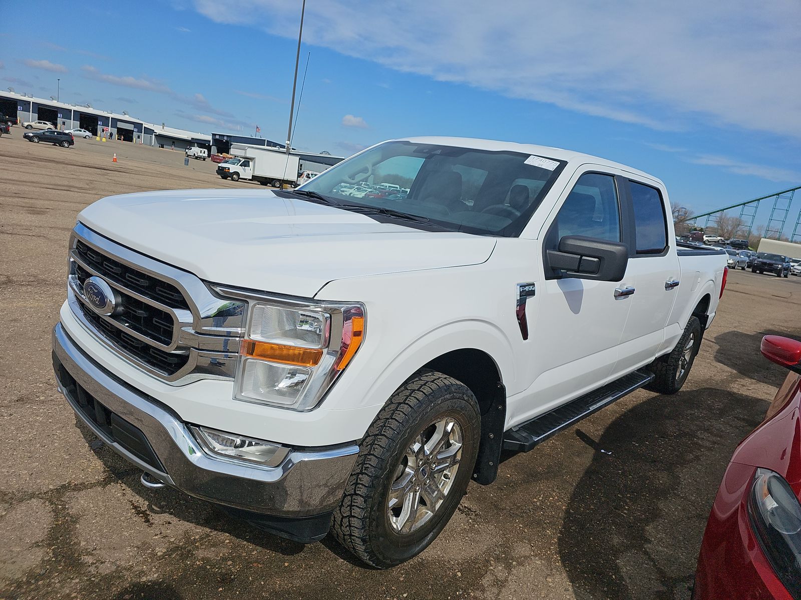 Used 2021 Ford F-150 XLT with VIN 1FTFW1E87MFA62236 for sale in Minneapolis, Minnesota