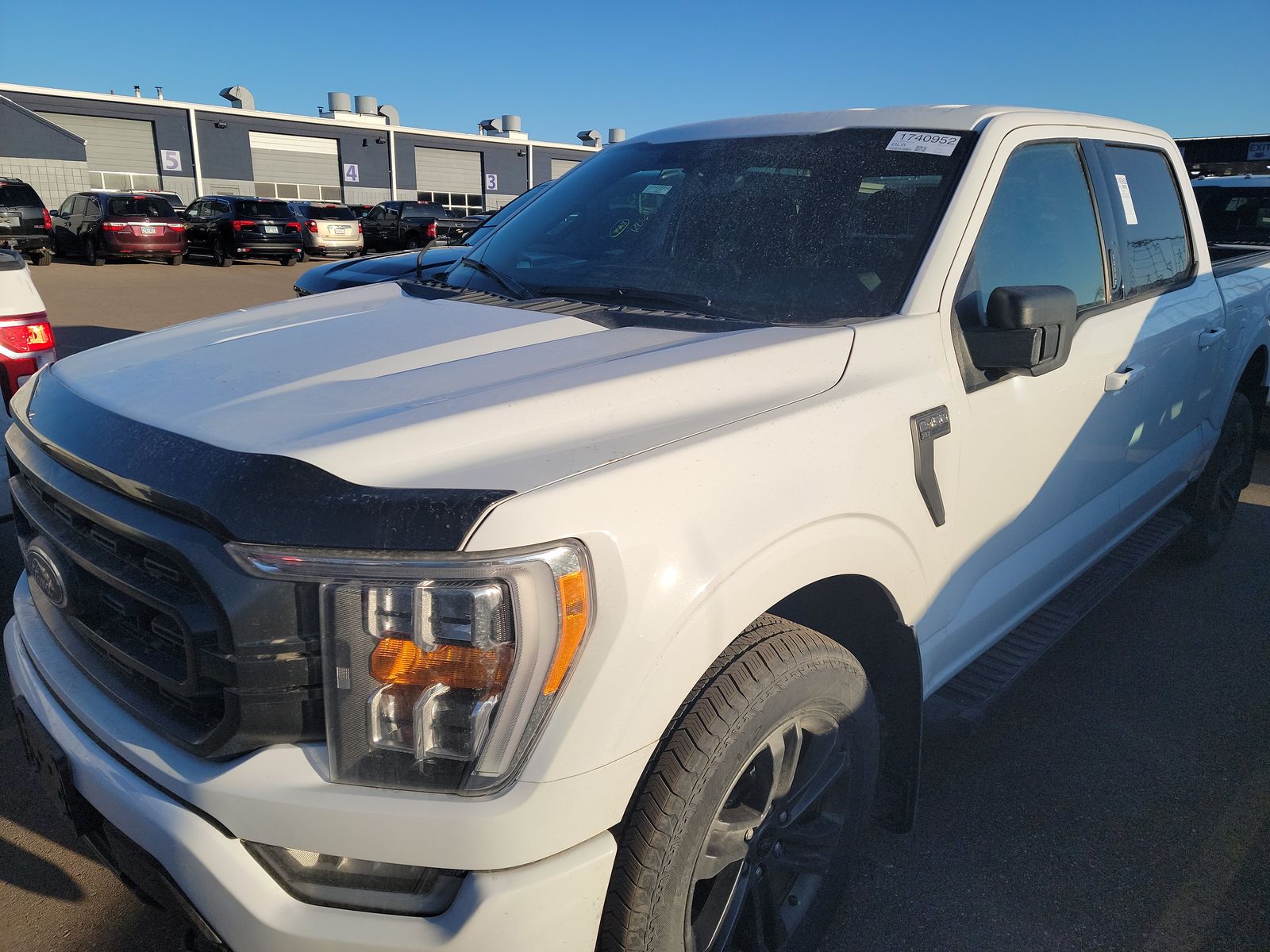 Used 2021 Ford F-150 XLT with VIN 1FTFW1E80MFC82978 for sale in Minneapolis, Minnesota