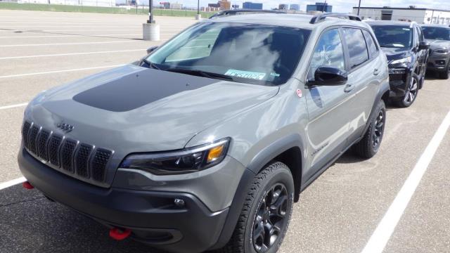 Used 2022 Jeep Cherokee Trailhawk with VIN 1C4PJMBXXND556362 for sale in Minneapolis, Minnesota