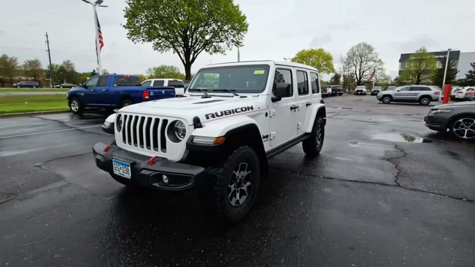 Used 2021 Jeep Wrangler Unlimited Rubicon with VIN 1C4HJXFG4MW751635 for sale in Minneapolis, Minnesota