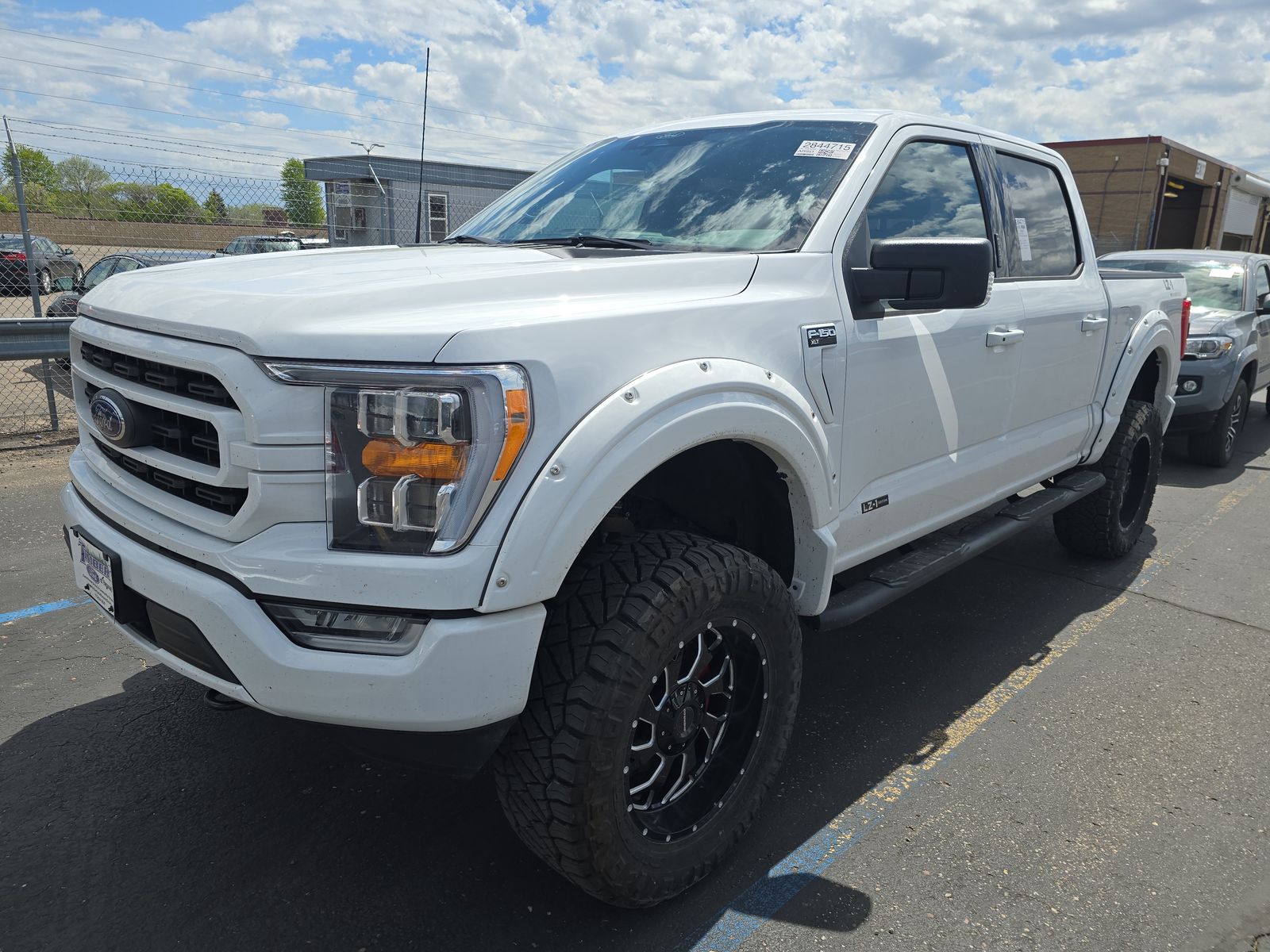 Used 2022 Ford F-150 XLT with VIN 1FTFW1E87NKE50088 for sale in Minneapolis, Minnesota