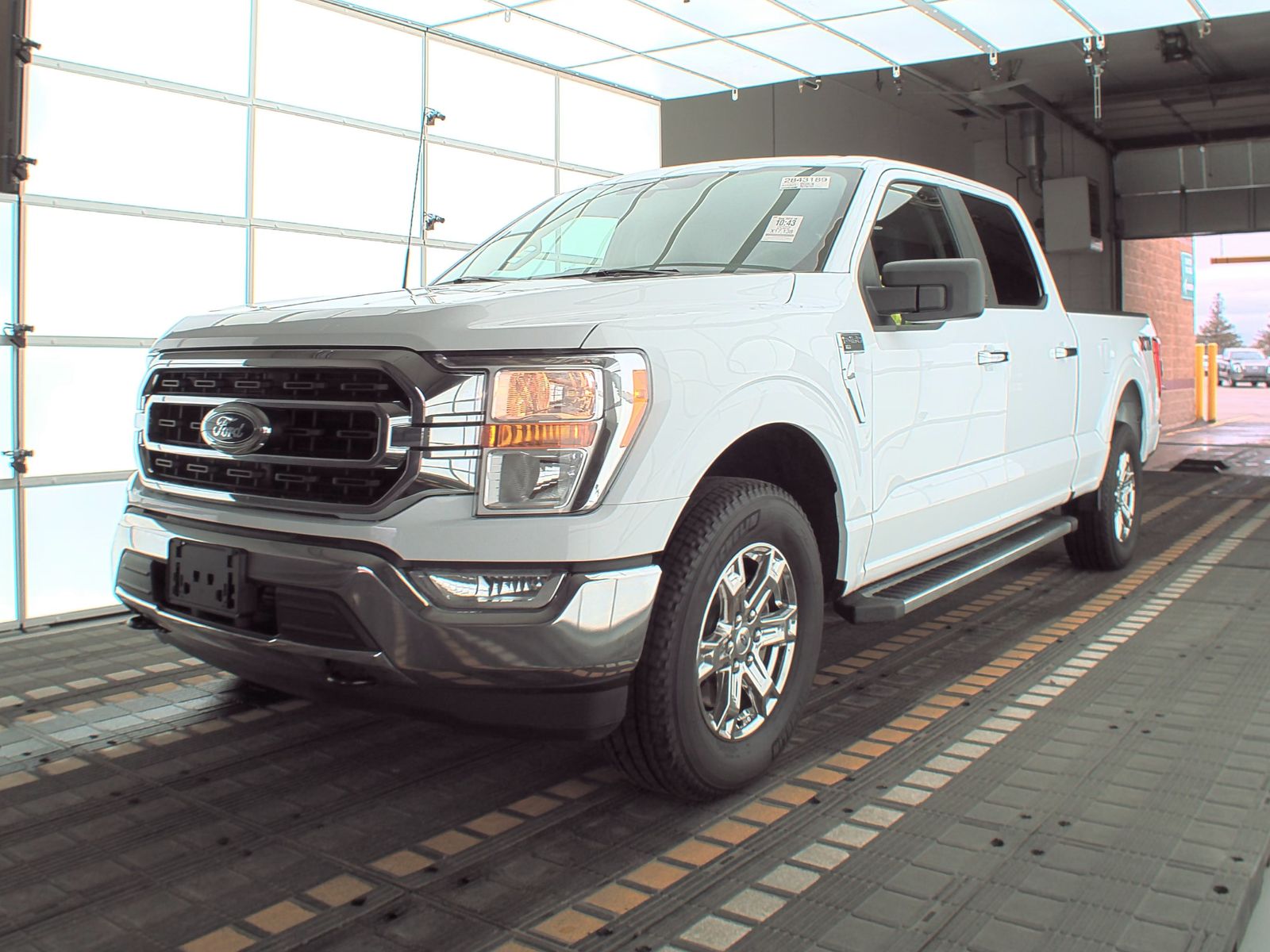 Used 2022 Ford F-150 XLT with VIN 1FTFW1E83NFB33627 for sale in Minneapolis, Minnesota