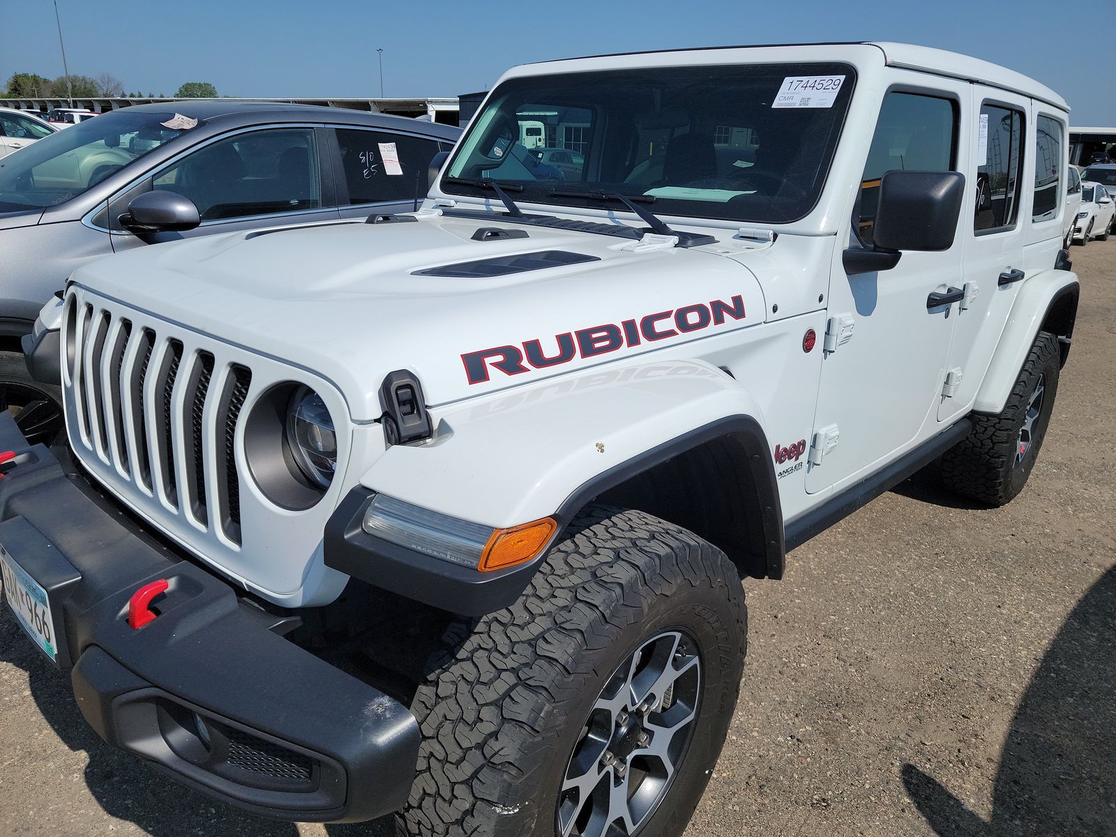 Used 2021 Jeep Wrangler Unlimited Rubicon with VIN 1C4HJXFN1MW660465 for sale in Minneapolis, Minnesota