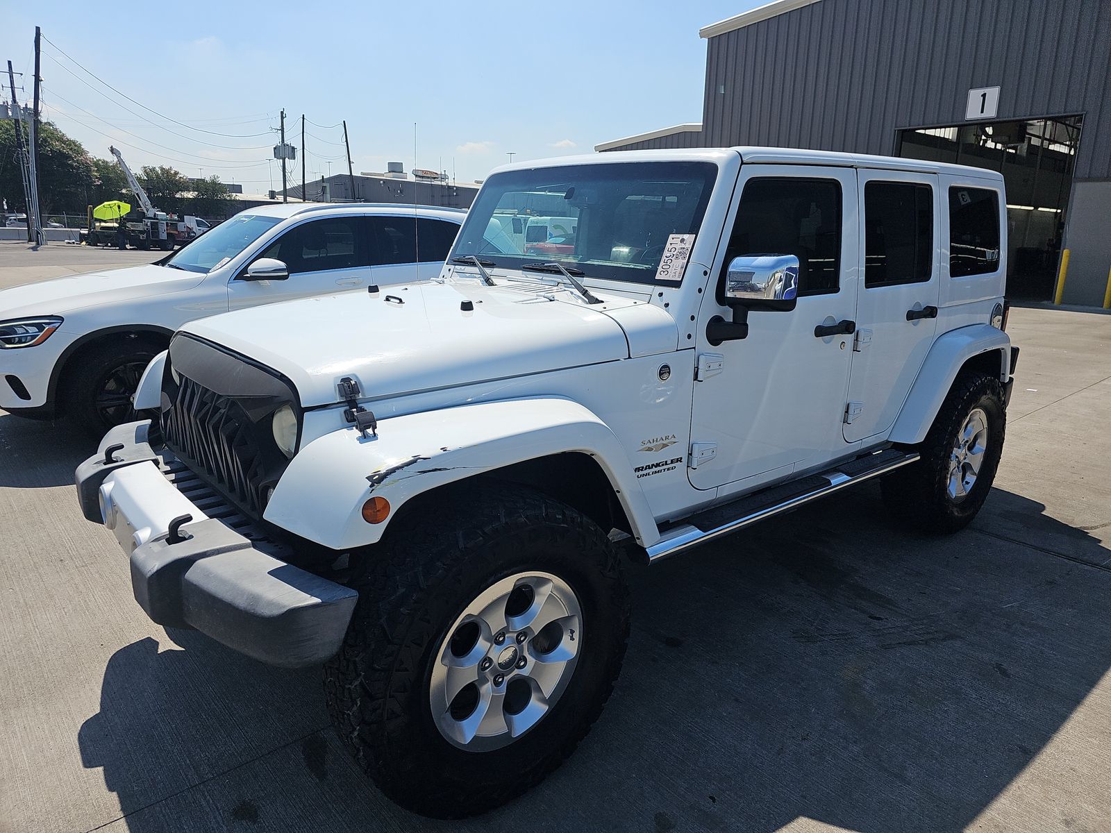 2014 Jeep Wrangler Unlimited Sahara AWD