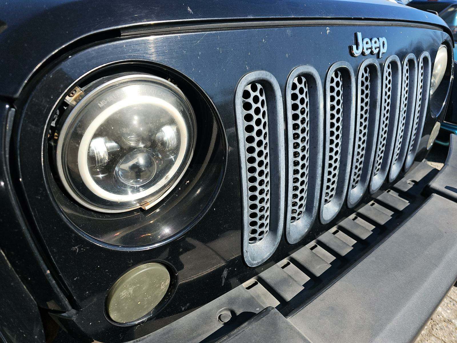 2013 Jeep Wrangler Unlimited Sahara AWD