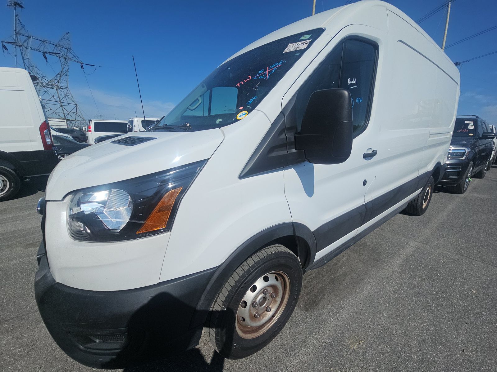 2024 Ford Transit 250 Med Roof 148 WB's photo